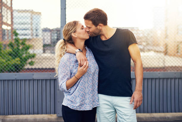 istock Loving demonstrative man kissing his girlfriend 488116696