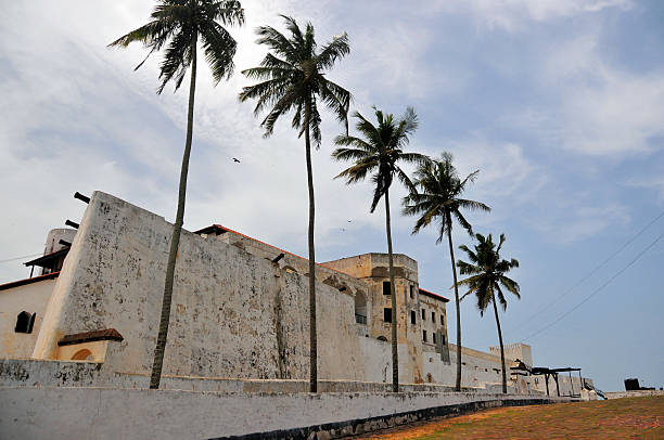istock Ghana, Elmina castle - southwest side with coconut trees 488119061