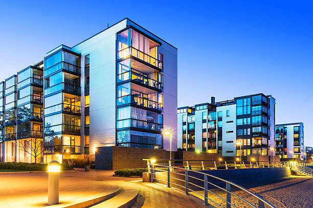 Modern real estate House building and city construction concept: evening outdoor urban view of modern real estate homes. See also: apartment balcony garden stock pictures, royalty-free photos & images