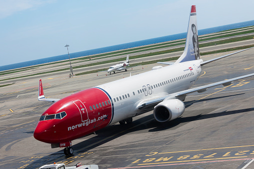 Nice, France - April 22, 2014: Norwegian Boeing 737-800 on the airfield of Nice Cote d'Azur airport after landing. Norwegian is the third largest low-cost carrier in Europe with a fleet of over 80 aircrafts.