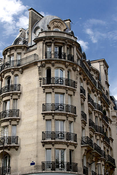 istock Paris apartment building facade, chimneys, rooftop and balconies, French architecture 488121069
