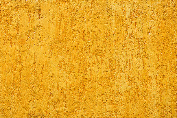Yellow porous wall stock photo