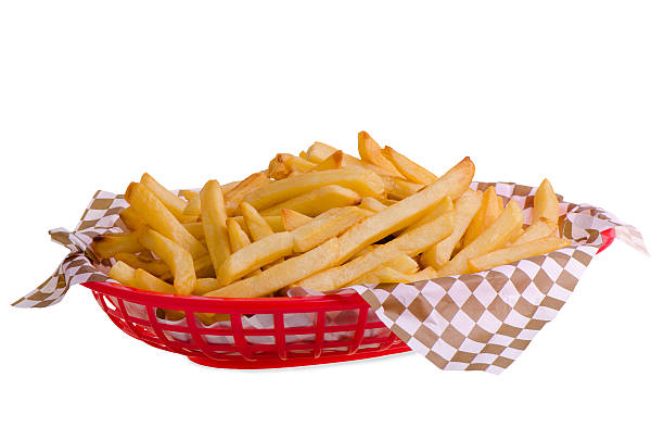 French fries in basket, isolated on white background.