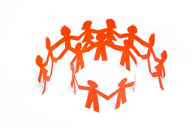 istock Paper team linked together partnership concept 488122983
