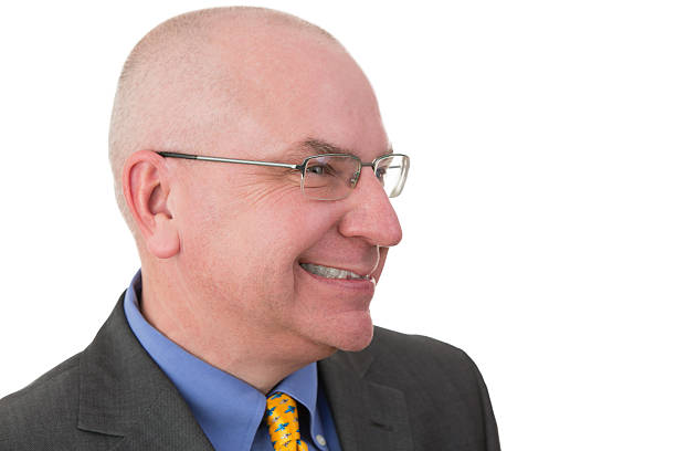 istock Middle-aged businessman giving a wry smile 488124439