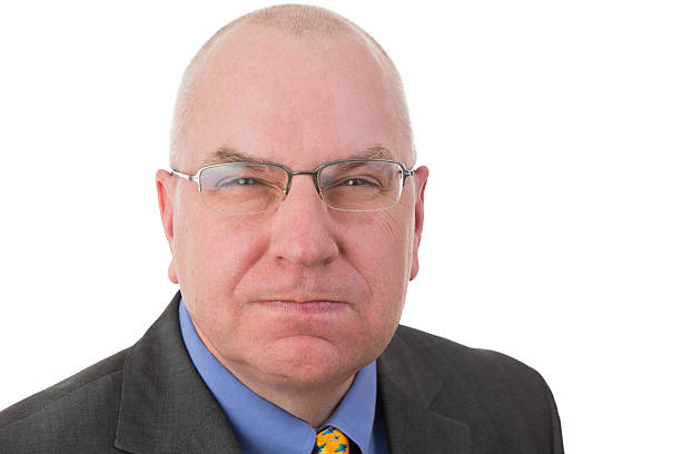 istock Revengeful middle-aged bald businessman 488124443