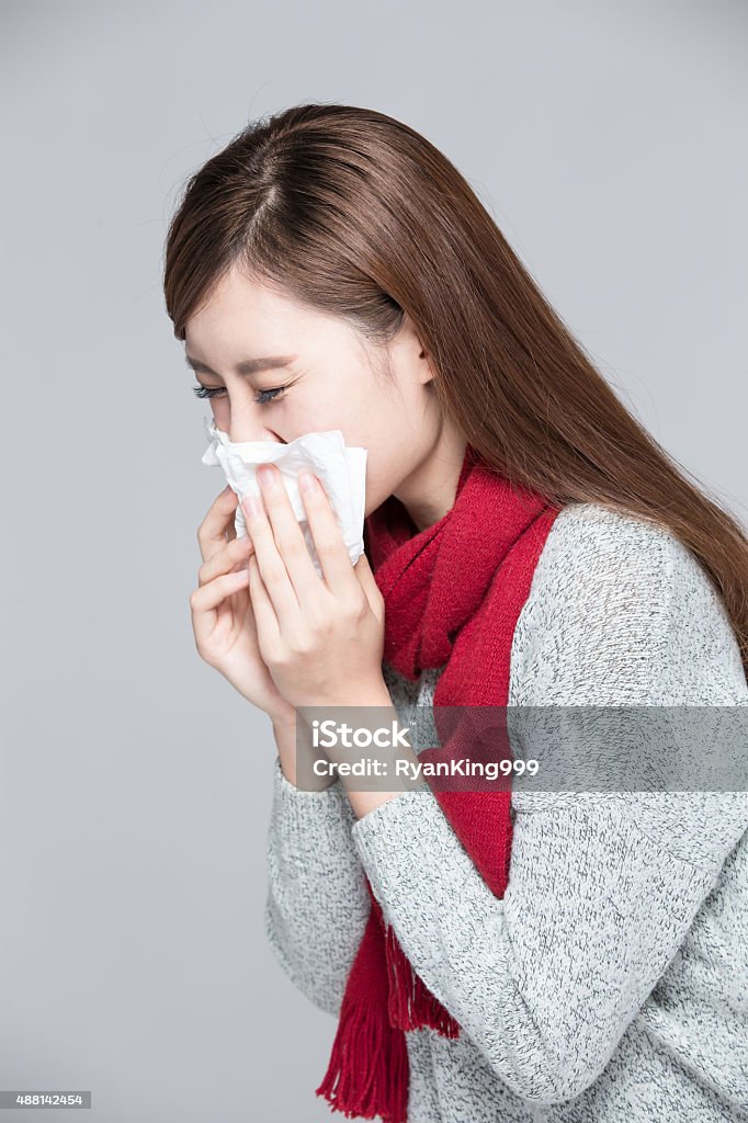 woman catches a cold feel bad Woman catches a cold, illness, asian 2015 Stock Photo