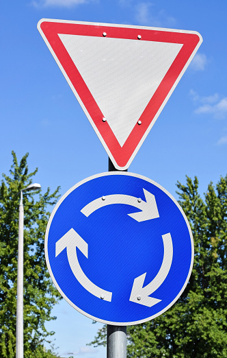 Yield And Roundabout Signs Stock Photo - Download Image Now - 2015 ...