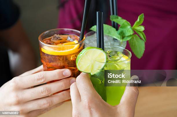 Aperitif With Friends Stock Photo - Download Image Now - Cocktail, Human Hand, Celebratory Toast