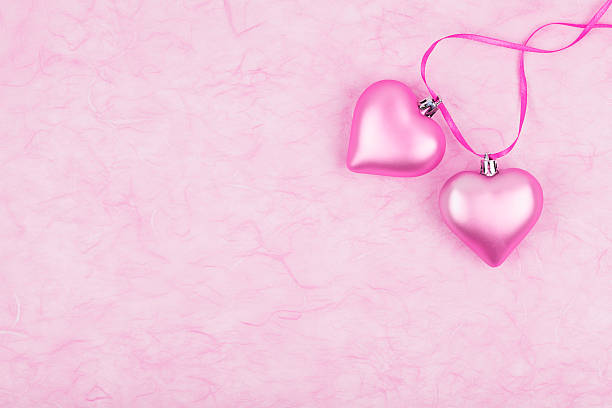 istock Two pink hearts on tissue paper 488148562