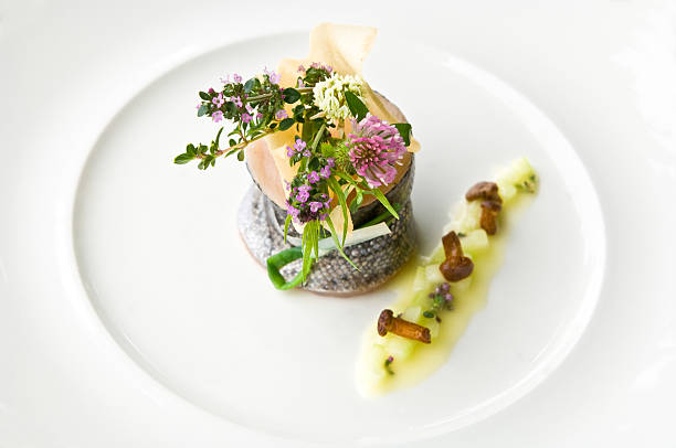 istock Samlet with mushrooms and herbs on plate, elevated view 488148620