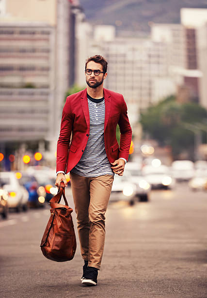 Styled for the city Shot of a handsome young man taking a walk through the cityhttp://195.154.178.81/DATA/i_collage/pi/shoots/784264.jpg preppy fashion stock pictures, royalty-free photos & images