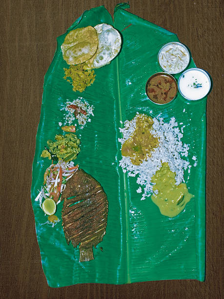 South Indian Thali (meals) with fish served traditionally on ban