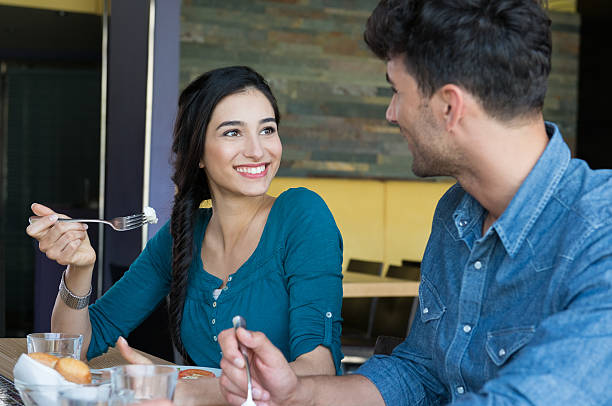 istock Happy couple having meal 488150940