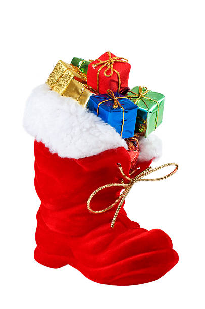 istock Santa Claus boots with gifts 488151692