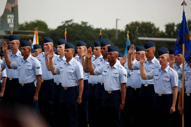 San Antonio, Texas, USA - September 11, 2015: Graduating Airmen swearing their oath as they graduate  Basic Military Training at Lackland Air Force Base.