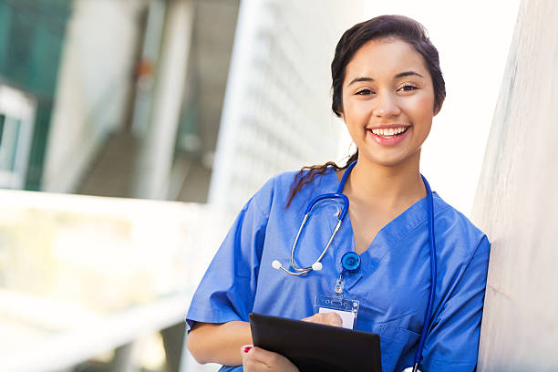 istock Hispanic nursing or medical student outside on college campus 488151864