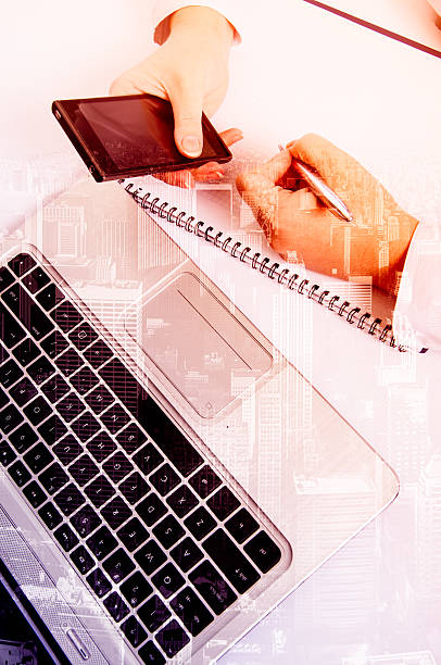 istock Double exposure modern technology as concept with laptop and phone 488153196