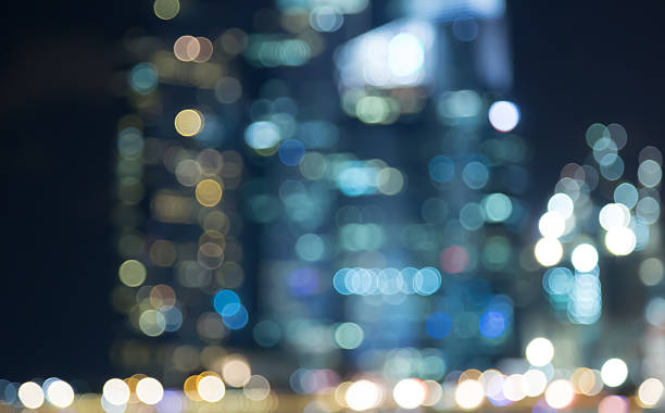 istock Singapore building city night lights blurred bokeh 488154442