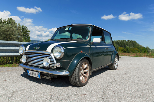 Ivrea, Italy - August 20, 2015: A 1998 limited edition Mini Cooper parked on a sunny day. This edition was launched to commemorate the 30th anniversary of the 1968 wins.