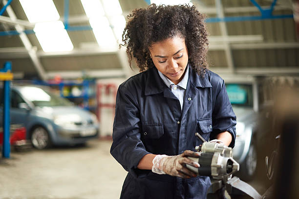 istock Cleaning an alternator in a garage 488155548