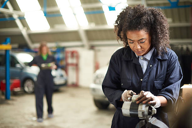 istock Cleaning an alternator in a garage 488156176