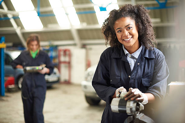 happy female auto mechanic