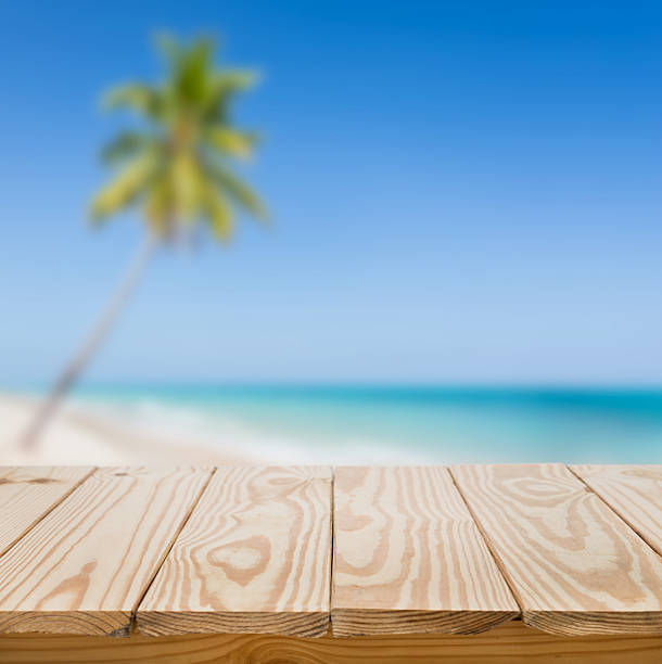 istock Wood table and blue sea background 488157144