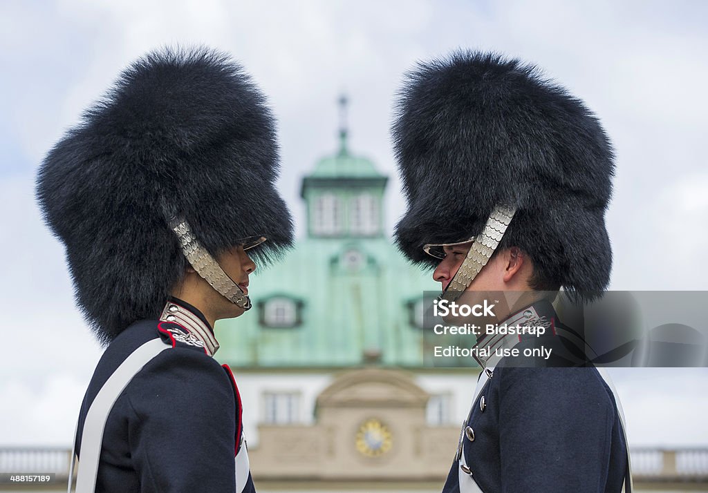 Sentries on guard Fredensborg, Denmark - August 25 2010: The guards is about to change at Fredensborg Castle. Fredensborg Palace at Esrum Lake in North Zealand in Denmark has a special status among Danish castles as the royal couple's residence after Amalienborg. Armed Forces Stock Photo