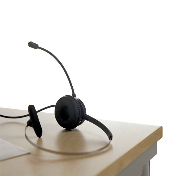 istock Headphones on a table isolated on white. 488157697