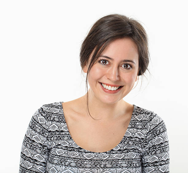 istock Happy Young Woman Smiling Portrait. 488157819