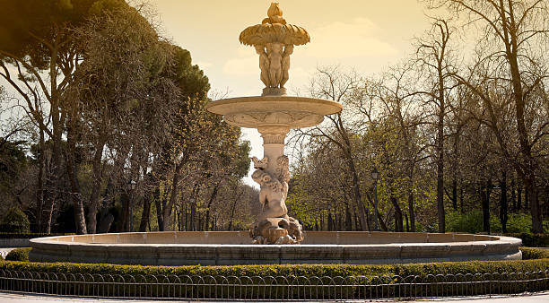 istock Vintage stone fountain in a park. 488158189