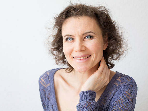istock Romantic woman smiling into camera 488159579