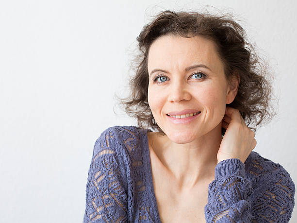 istock Romantic woman with attractive smile 488159581