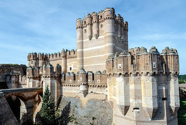 Coca Castle, Castillo de Coca in Segovia province Coca, Spain - April 14, 2014: Coca Castle (Castillo de Coca) is a fortification constructed in the 15th century built in Gothic and Moorish style. and is located in Coca, in Segovia province, Castilla y Leon, Spain. cocaine stock pictures, royalty-free photos & images