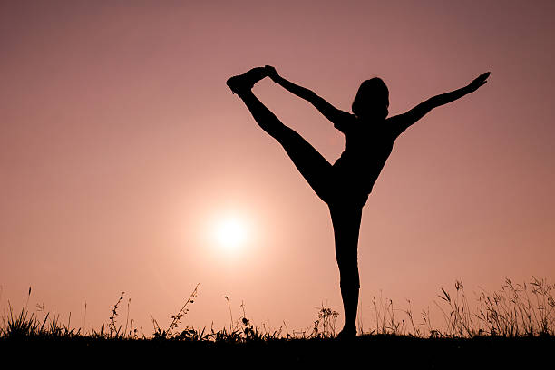 istock Silhouette woman with standing position yoga. 488160683