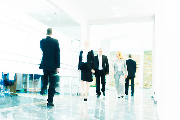 istock Businesspeople Walking in a Modern Interior 488174737