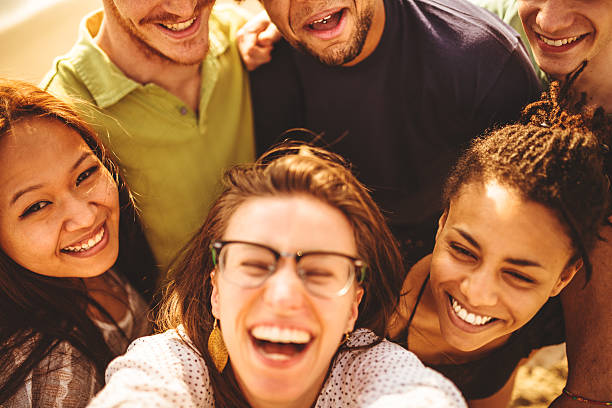 istock Group of friends laughing and doing a selfie 488176063