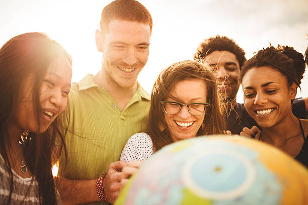 istock teenagers college student smiling with globe 488178933