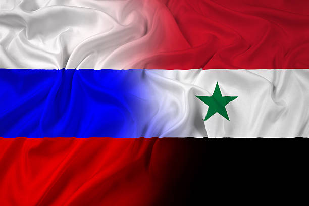 istock Waving Russia and Syria Flag 488178989