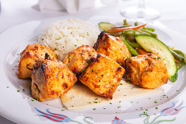istock Zesty Chicken Shish Kebabs served on a Lavash Bread 488180175