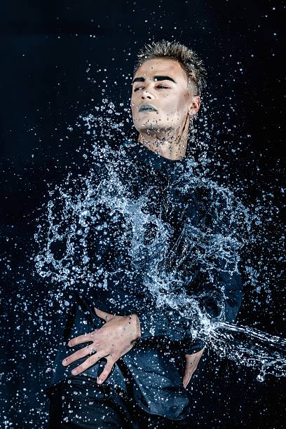 istock Water splash photography. Stop water liquid men in studio 488180697