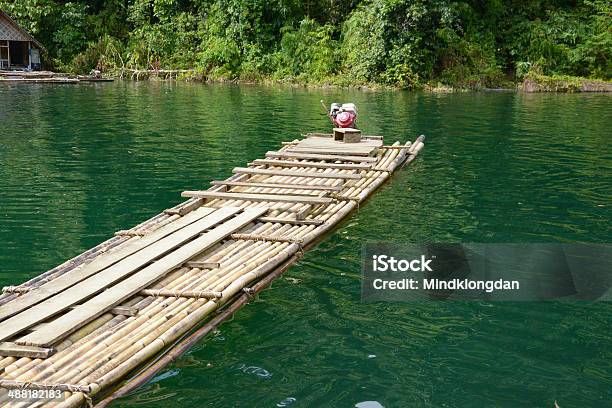 Bamboo Rafts In Cheow Lan Lake Thailand Stock Photo - Download Image Now - Blue, Exploration, Grass