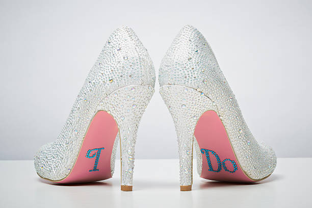 istock Bridal wedding shoes with I do message on sole 488199547