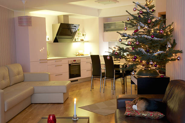 Christmas tree in beautiful modern apartment stock photo