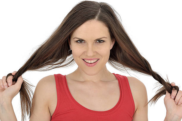 istock Young Woman Playing With Her Hair 488202515