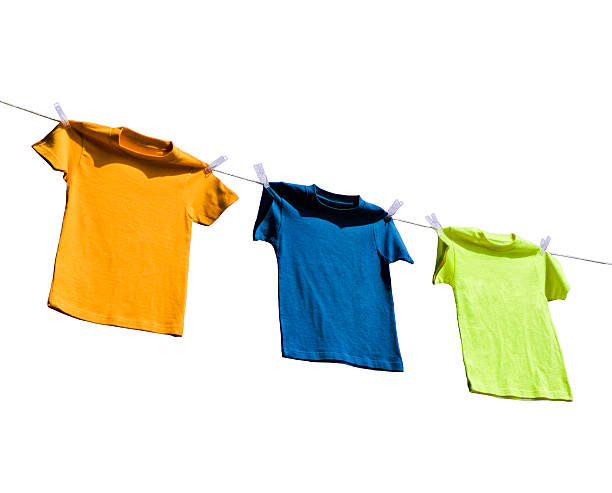 istock Photograph of four blank t-shirts 488203529