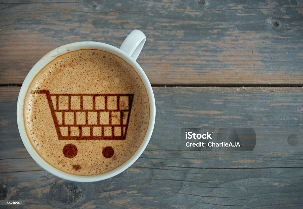 Shopping cart symbol Shopping cart symbol inside a cup of coffee with space Coffee - Drink Stock Photo