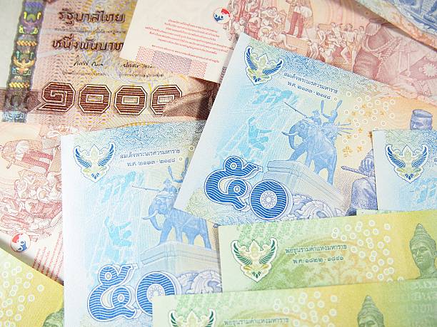 istock Banknotes on Thai Baht Money Background 488211340