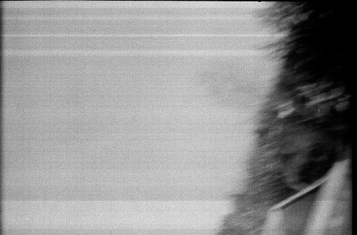 Abstract background scan a black-and-white film. Noise. Scratches. Garbage. Blurry. The hell it is not clear.